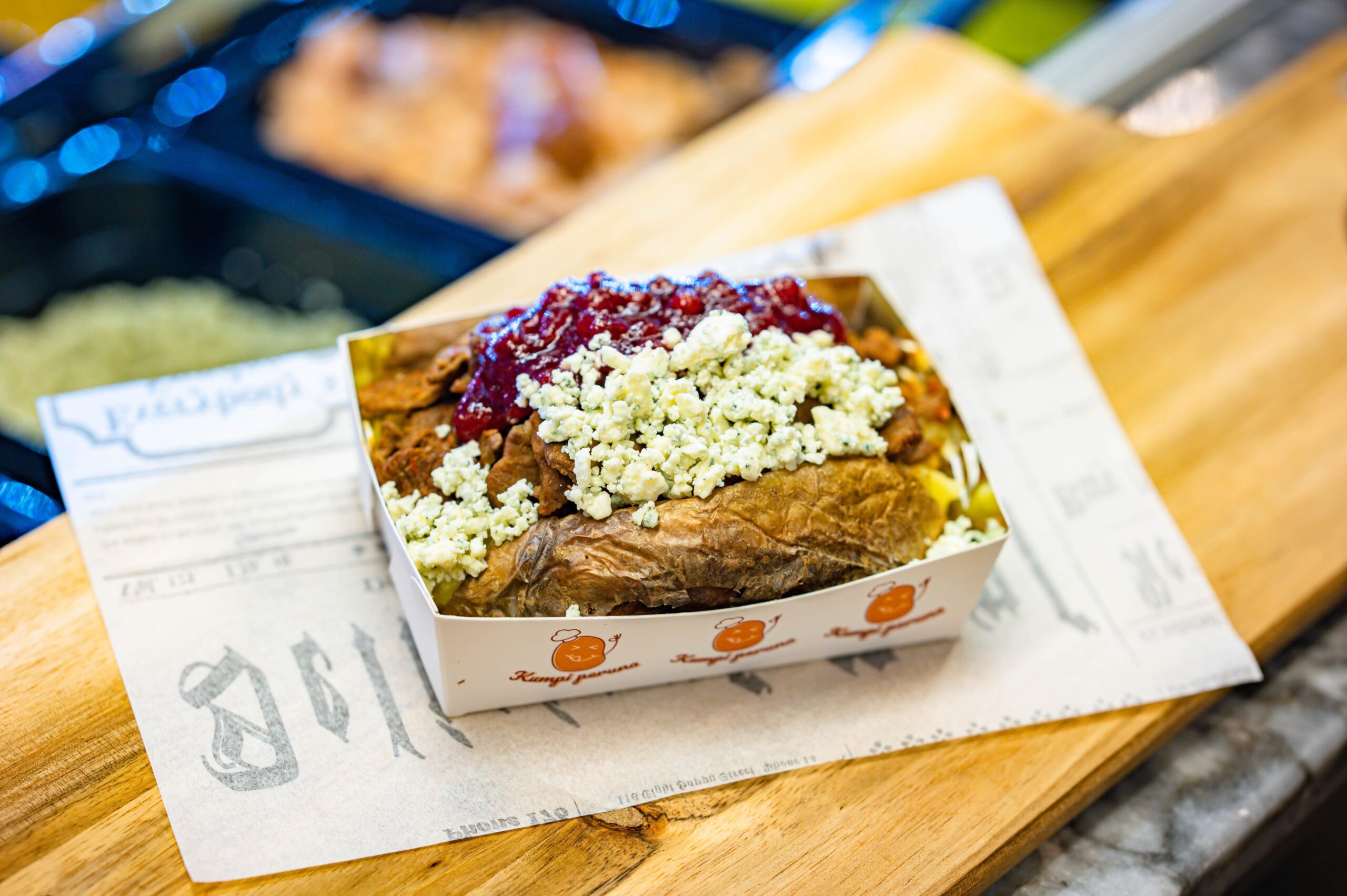 Baked potato with reindeer, lingonberries, and blue cheese – casual luxury for lunch