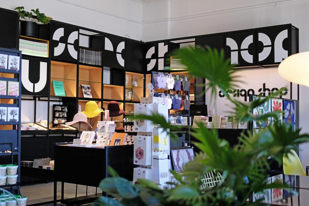 a store with shelves and plants