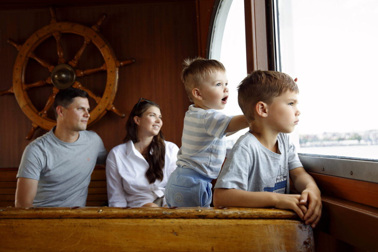 Family on a ferry to Suomenlinna Sea Fortress