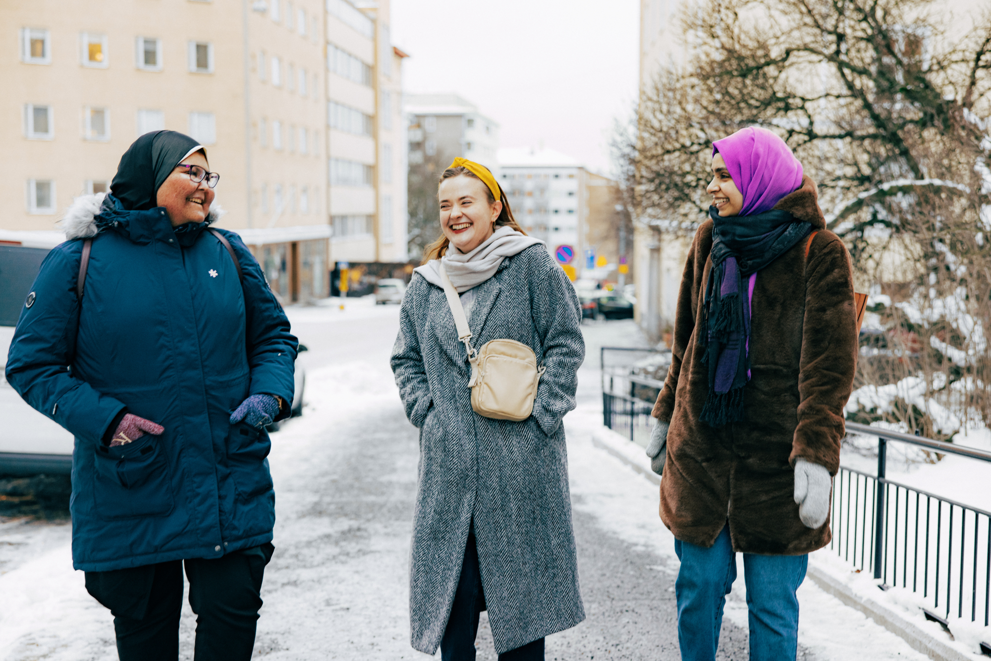 Friends walking in Kallio district