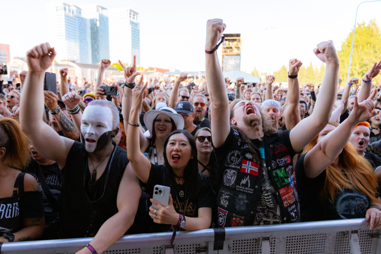 a group of people with their arms raised in the air at Tuska Helsinki 